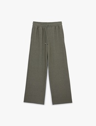 Beli Bağcıklı Cepli Düz Bol Paça Çizgili Pantolon