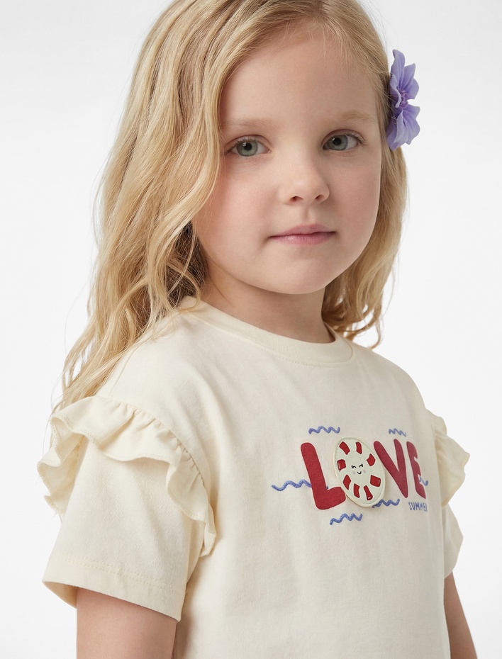 Kız Bebek Kısa Kollu Fırfırlı Bisiklet Yaka Pamuklu Aplike Detaylı Baskılı Tişört