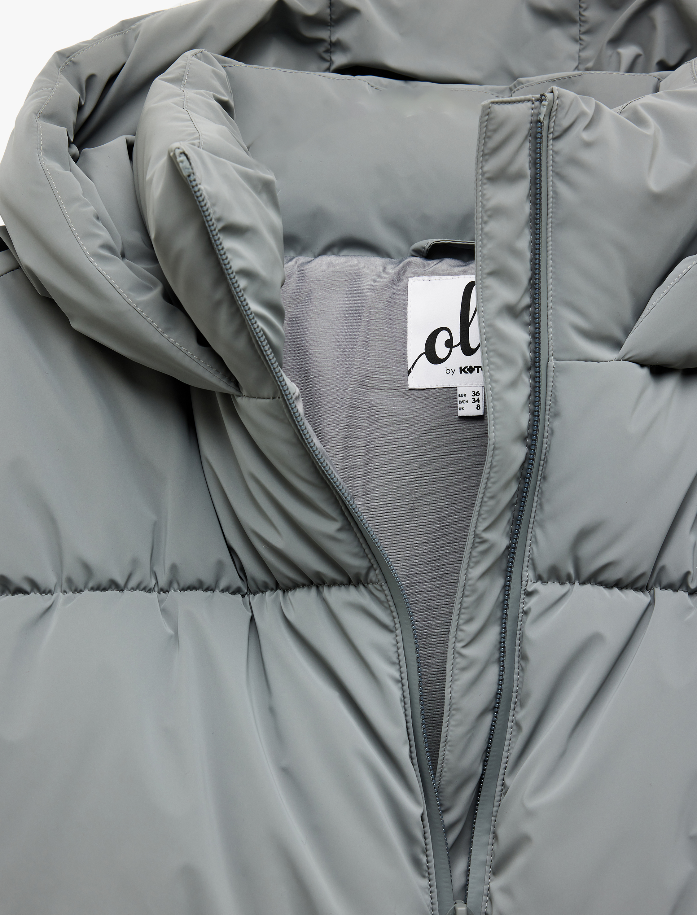   Kapüşonlu Uzun Kollu Cep Detaylı Fermuarlı Kapitone Su İtici Şişme Mont