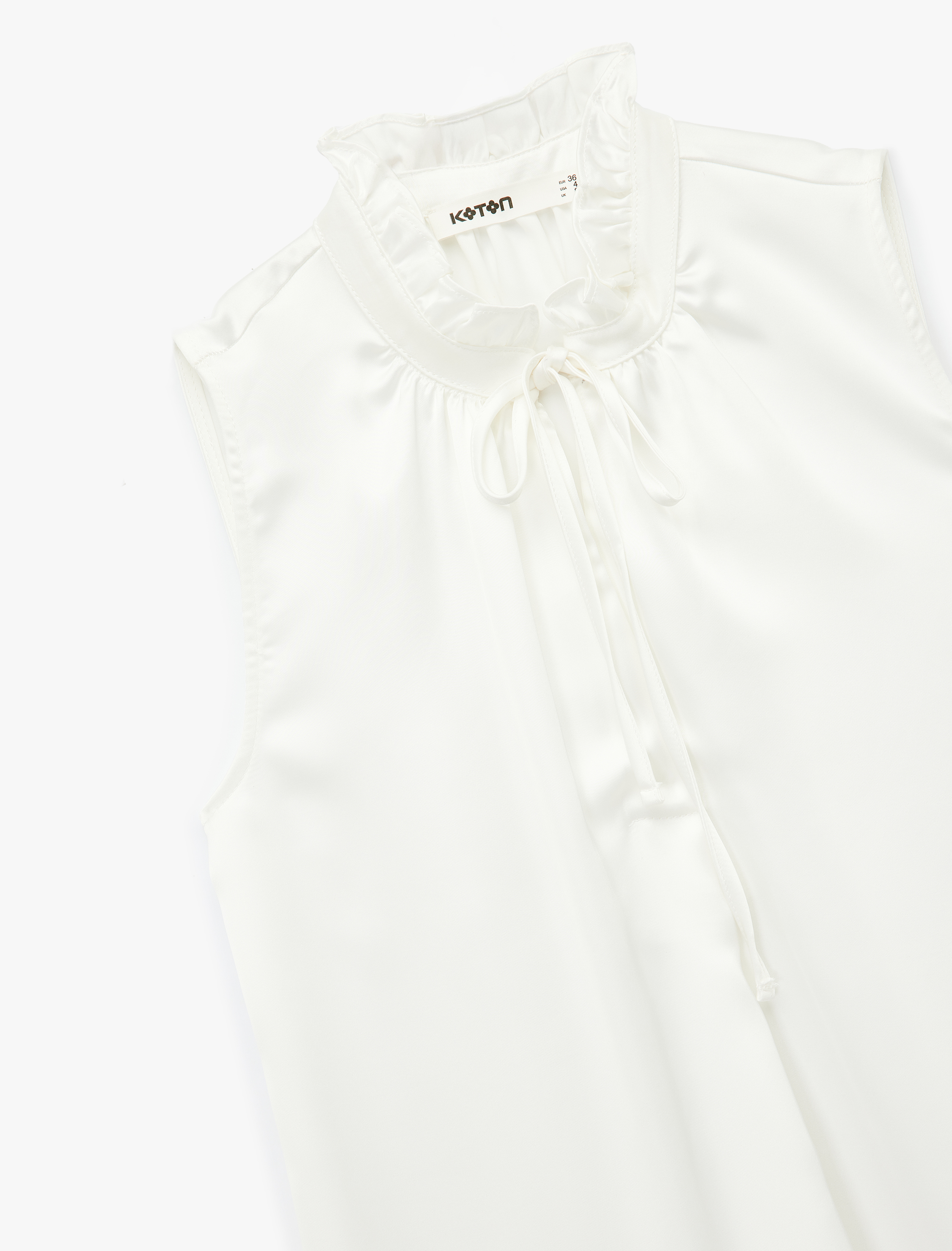   Bağlama Detaylı Dik Fırfırlı Yaka Kolsuz Gömlek