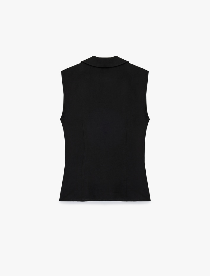  Fiyonk Bağlama Detaylı Gömlek Yaka Kolsuz Kruvaze Bluz