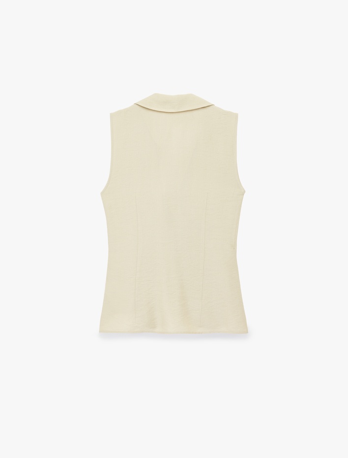  Fiyonk Bağlama Detaylı Gömlek Yaka Kolsuz Kruvaze Bluz