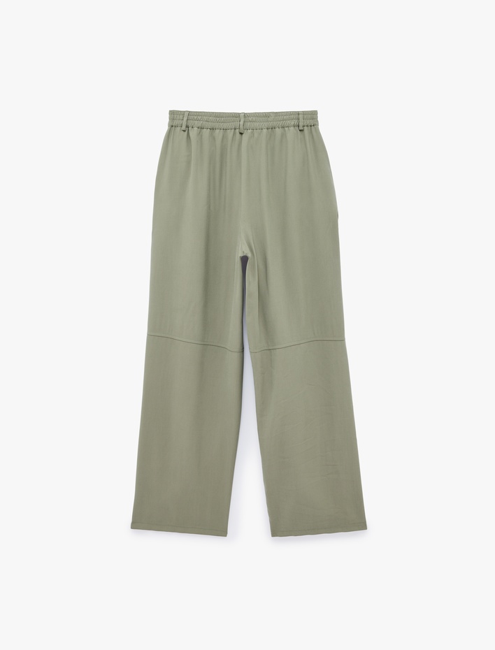  Viskon Cupro Kumaş Beli Lastikli Cepli Düz Bol Paça Pantolon