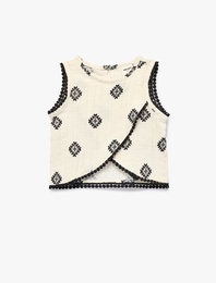 Asimetrik Kesim Bisiklet Yaka Kolsuz Nakışlı Müslin Bluz