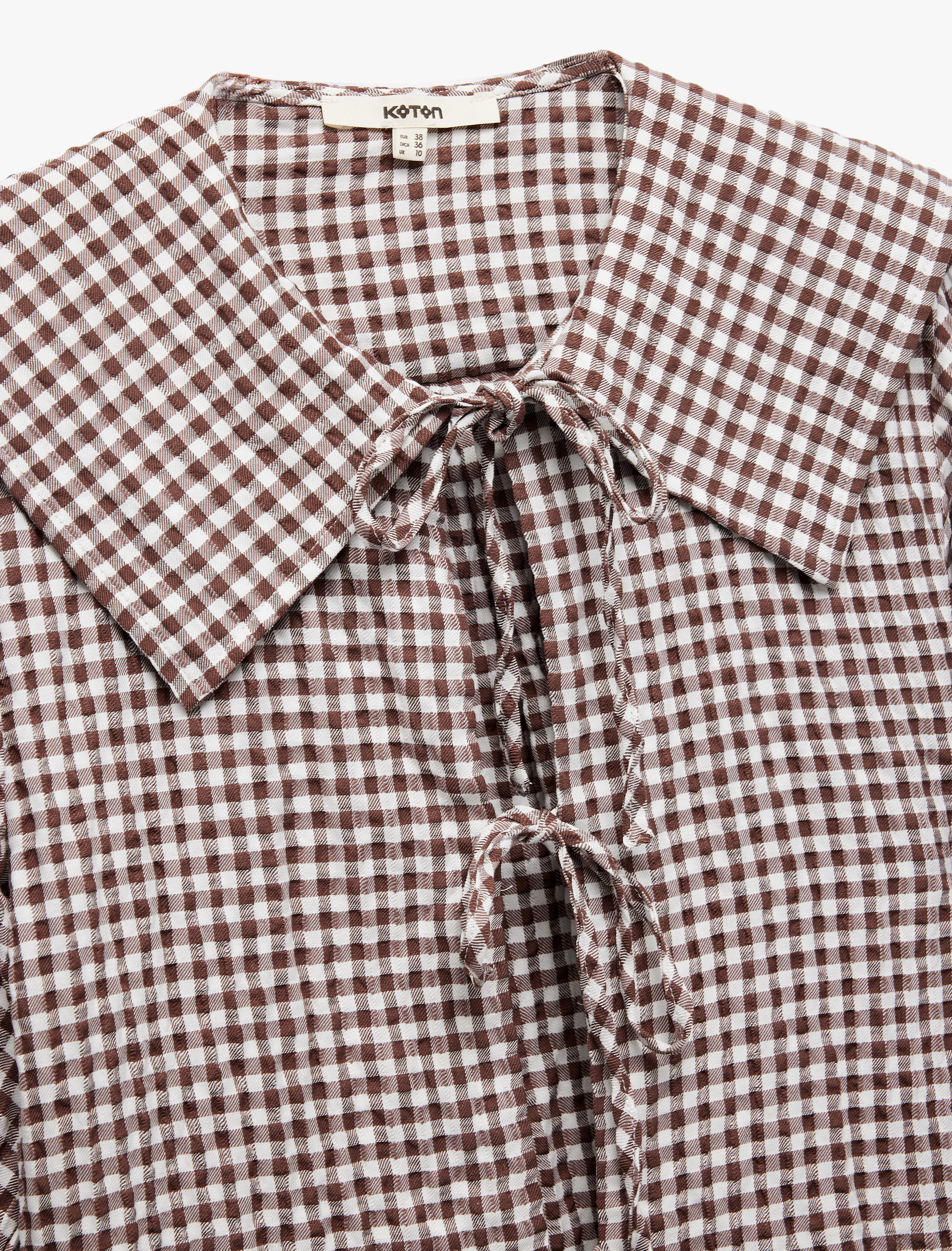   Gömlek Yaka Yarım Balon Kollu Bağcıklı Fiyonk Detaylı Pötikareli Crop Bluz