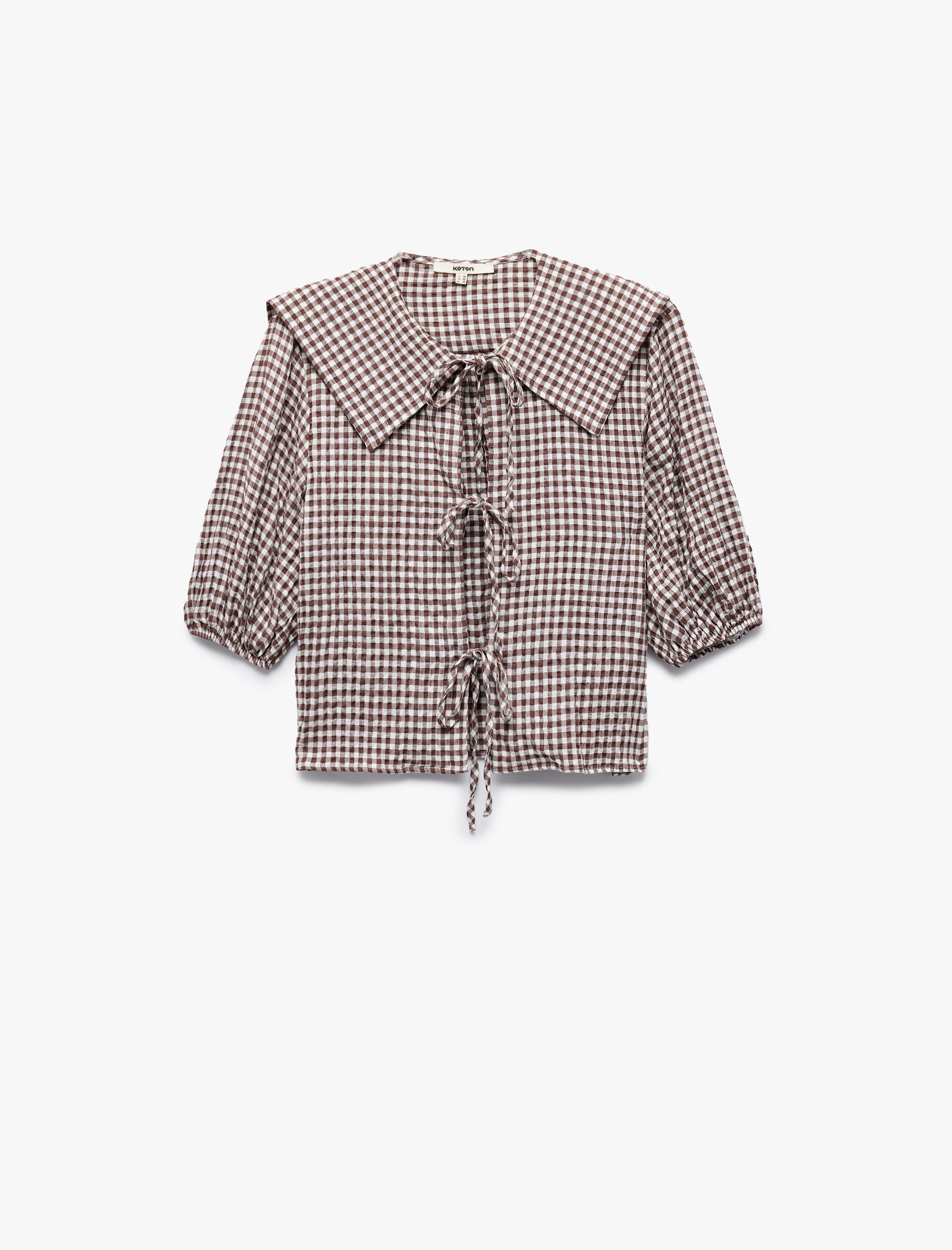   Gömlek Yaka Yarım Balon Kollu Bağcıklı Fiyonk Detaylı Pötikareli Crop Bluz