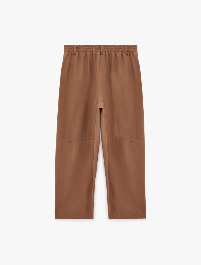  Viskon Cupro Kumaş Beli Lastikli Cepli Düz Bol Paça Pantolon