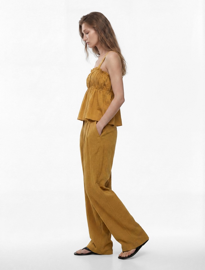  Viskon Dokulu Kumaş Cepli Pile Detaylı Geniş Paça Palazzo Pantolon