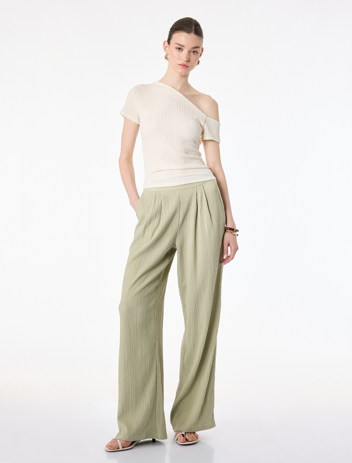  Bürümcük Dokulu Kumaş Pile Detaylı Cepli Geniş Paça Pantolon