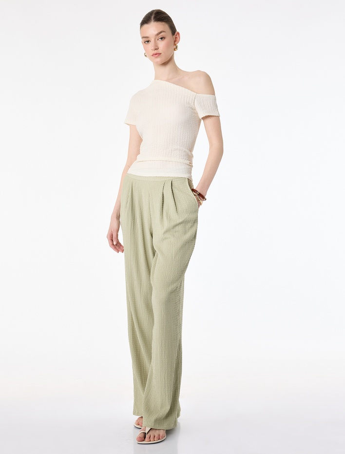  Bürümcük Dokulu Kumaş Pile Detaylı Cepli Geniş Paça Pantolon