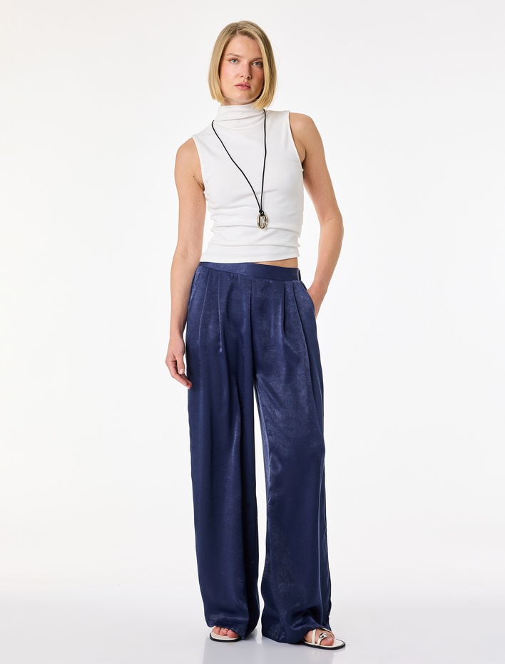  Normal Bel Pileli Cep Detaylı Geniş Paça Saten Pantolon