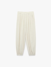 Dokulu Dökümlü Kumaş Cepli Pileli Harem Pantolon