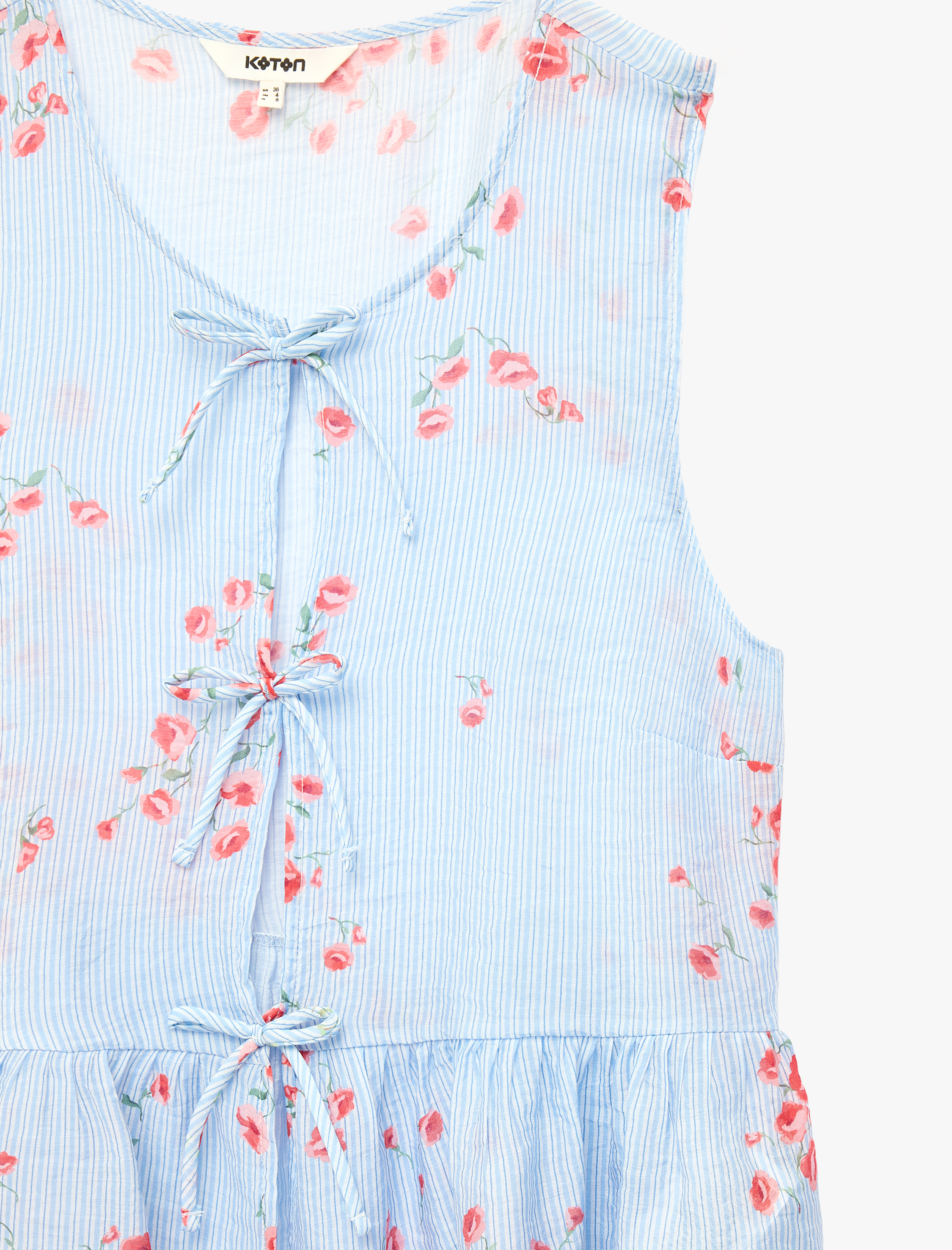   Yuvarlak Bağcıklı Yaka Fiyonklu Kolsuz Çizgili Çiçek Detaylı Fırfırlı Peplum Bluz