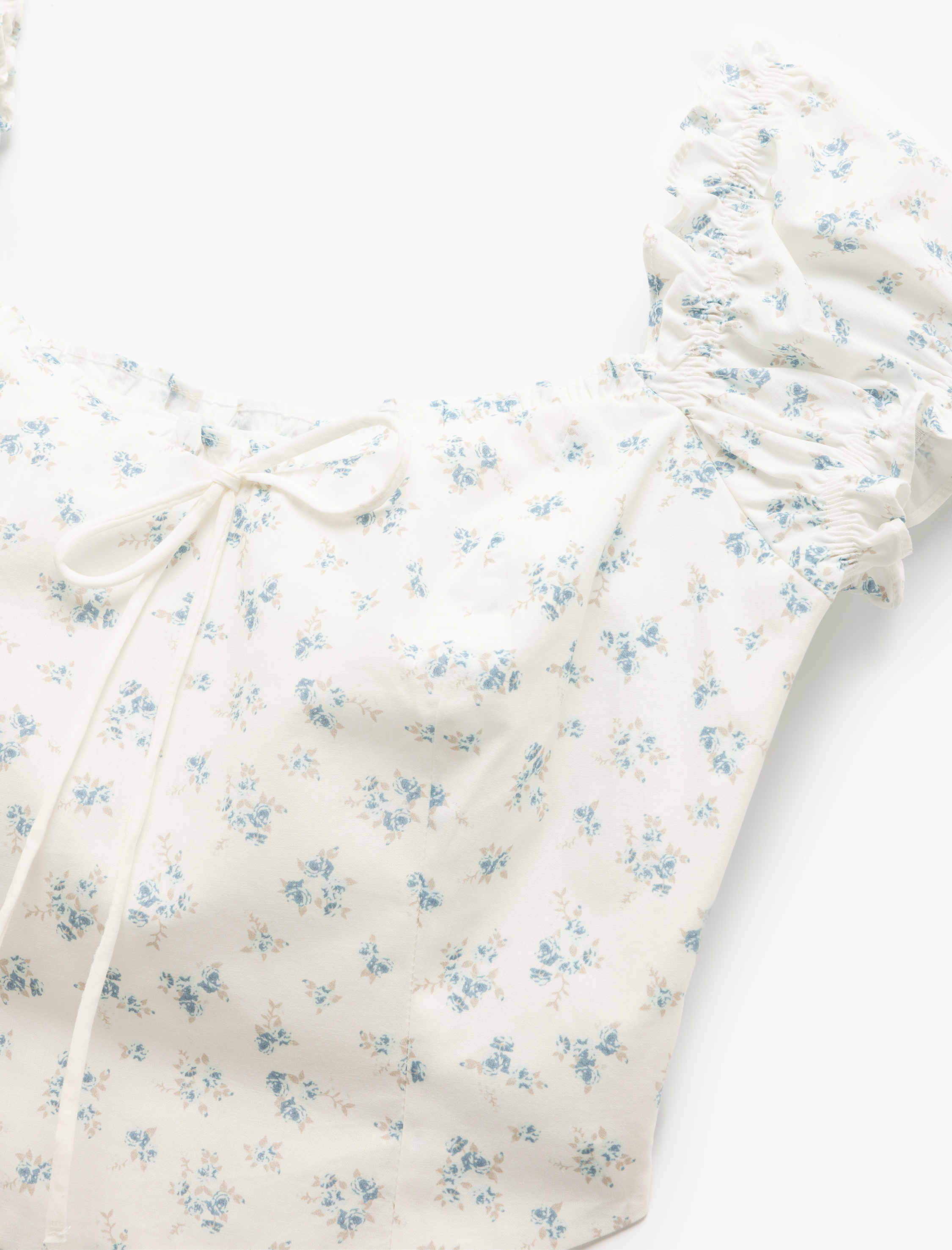   Kayık Yaka Bağcık Detaylı Fermuarlı Çiçekli Dar Kesim Poplin Crop Bluz
