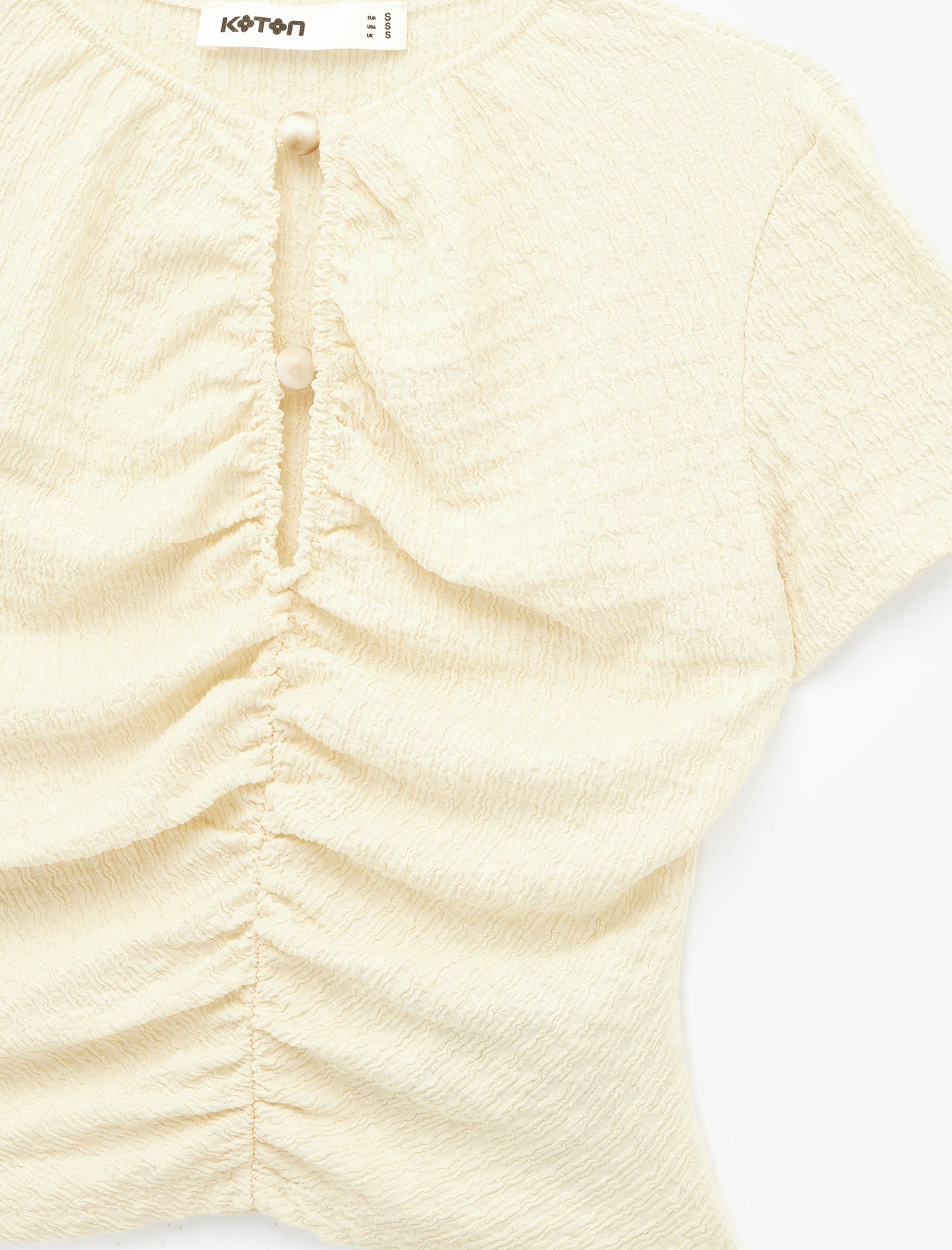   Bürümcük Kumaş Dokulu Slim Fit Kısa Kollu Pencere Detaylı Drapeli Bel Vurgulu Crop Bluz