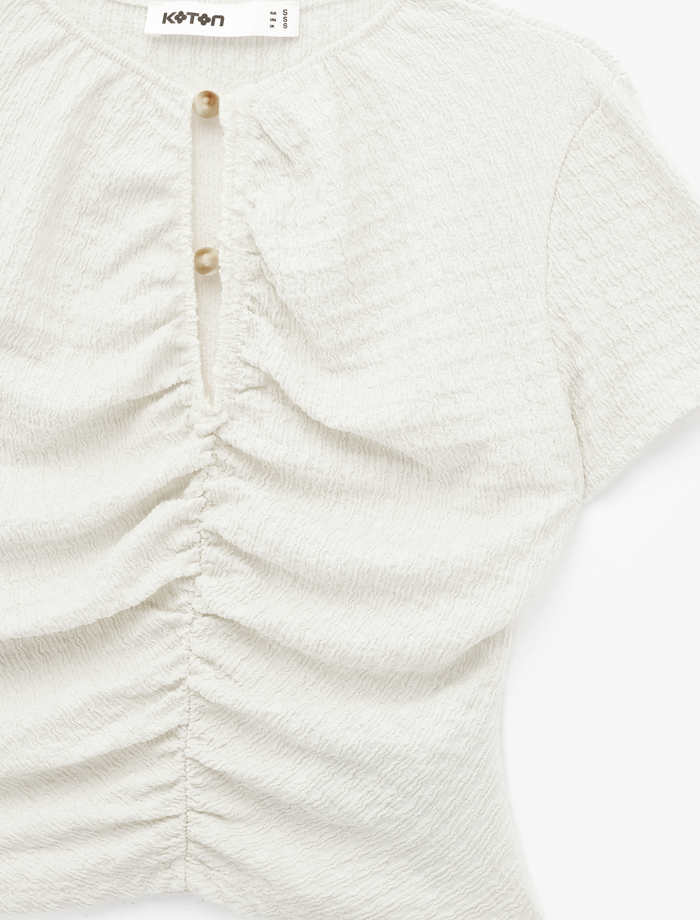   Bürümcük Kumaş Dokulu Slim Fit Kısa Kollu Pencere Detaylı Drapeli Bel Vurgulu Crop Bluz