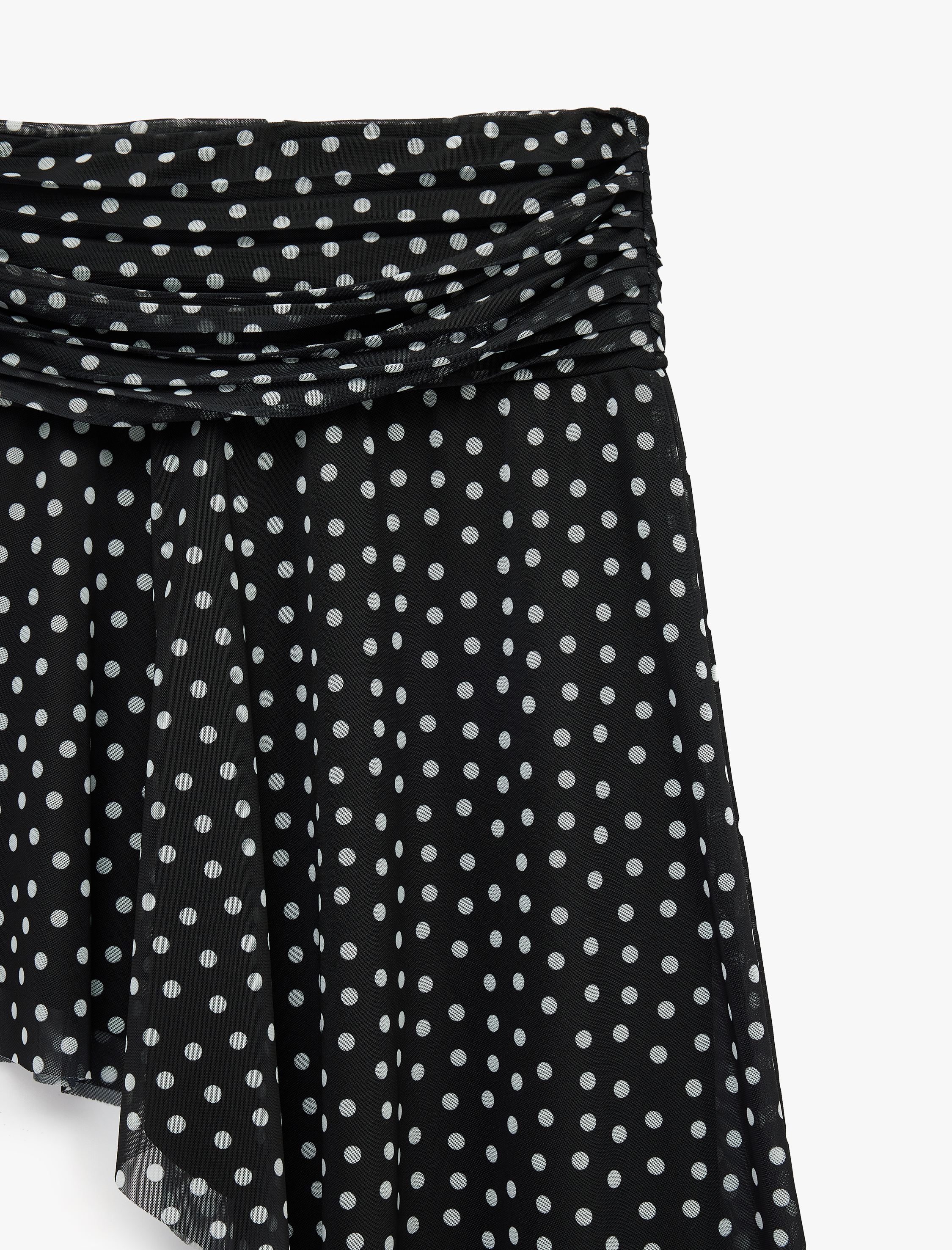   Koton X Sibil Çetinkaya - Drapeli Slim Fit Puantiyeli Asimetrik Midi Etek