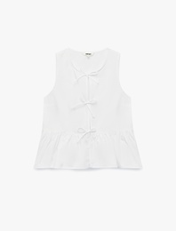 Pamuklu Kolsuz Yuvarlak Yaka Peplum Kesim Fiyonklu Poplin Bluz