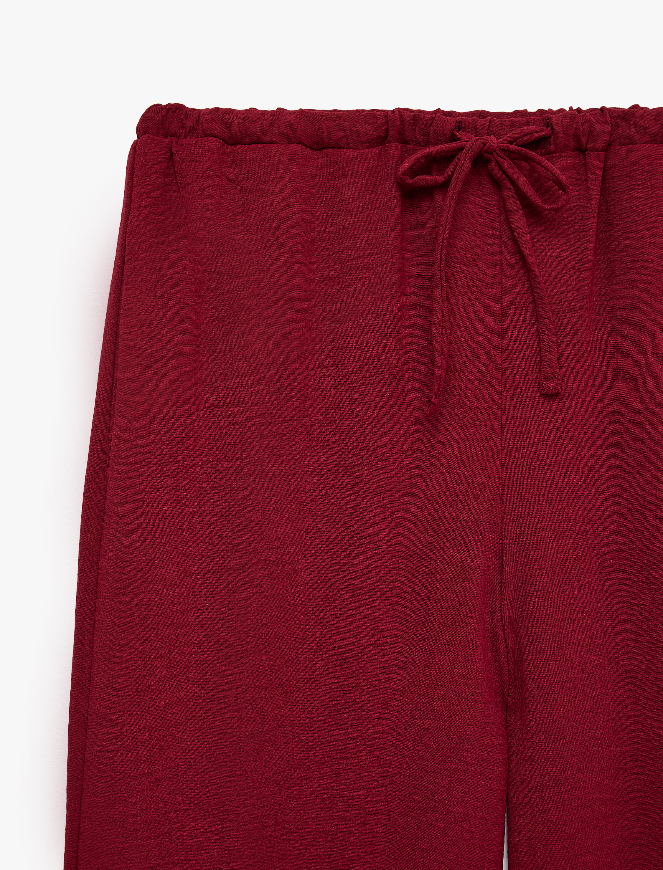   Keten Görünümlü Beli Bağcıklı Cepli Düz Geniş Paça Pantolon