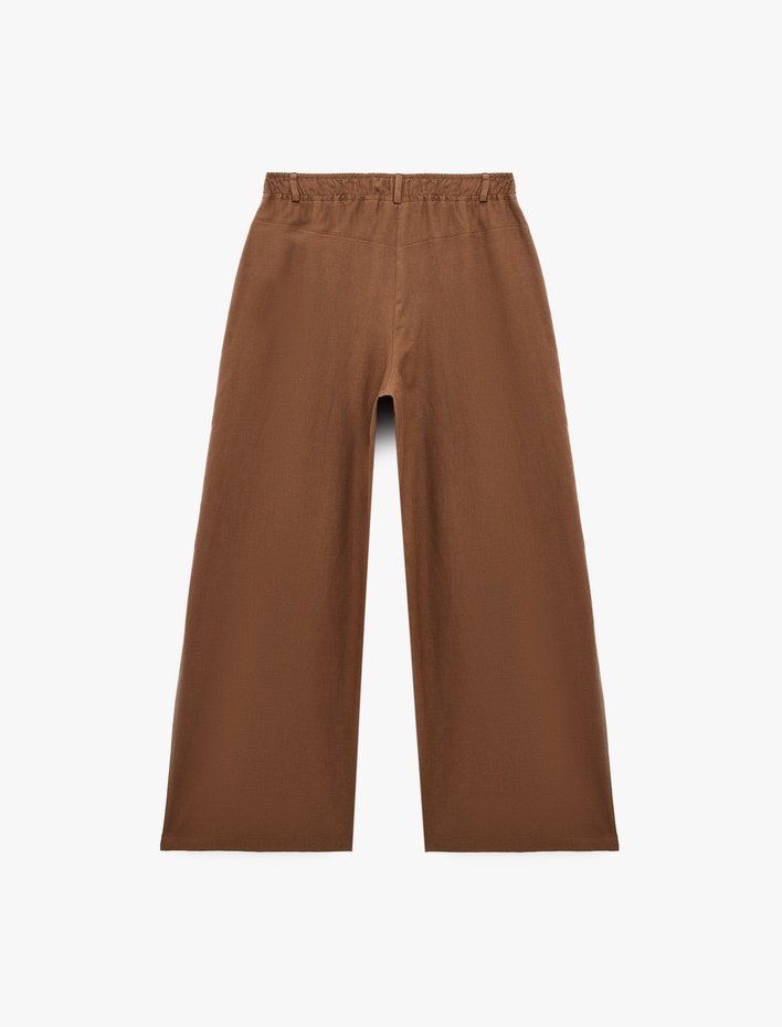  Koton X Şahika Ercümen - Cepli Pile Detaylı Baggy Keten Pantolon