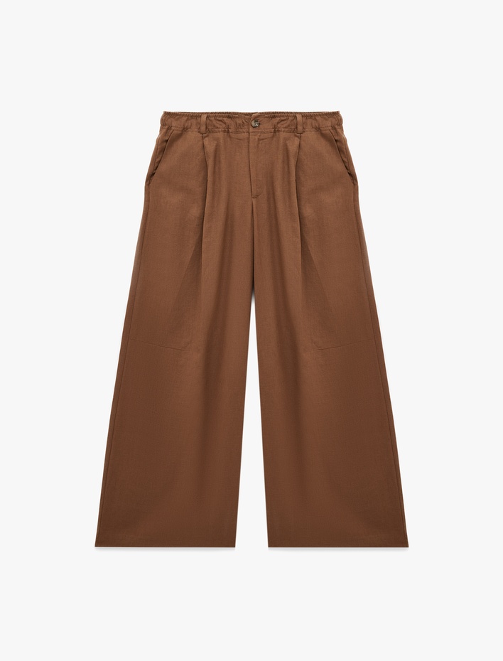  Koton X Şahika Ercümen - Cepli Pile Detaylı Baggy Keten Pantolon