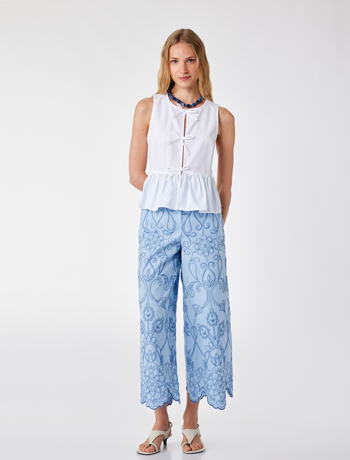  Pamuklu Kolsuz Yuvarlak Yaka Peplum Kesim Fiyonklu Poplin Bluz