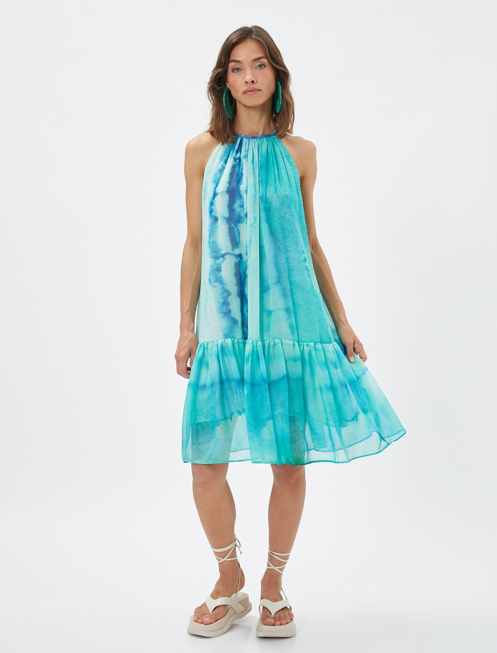  Koton X Selected by Şahika Ercümen - Halter Yaka Batik Desenli Midi Elbise