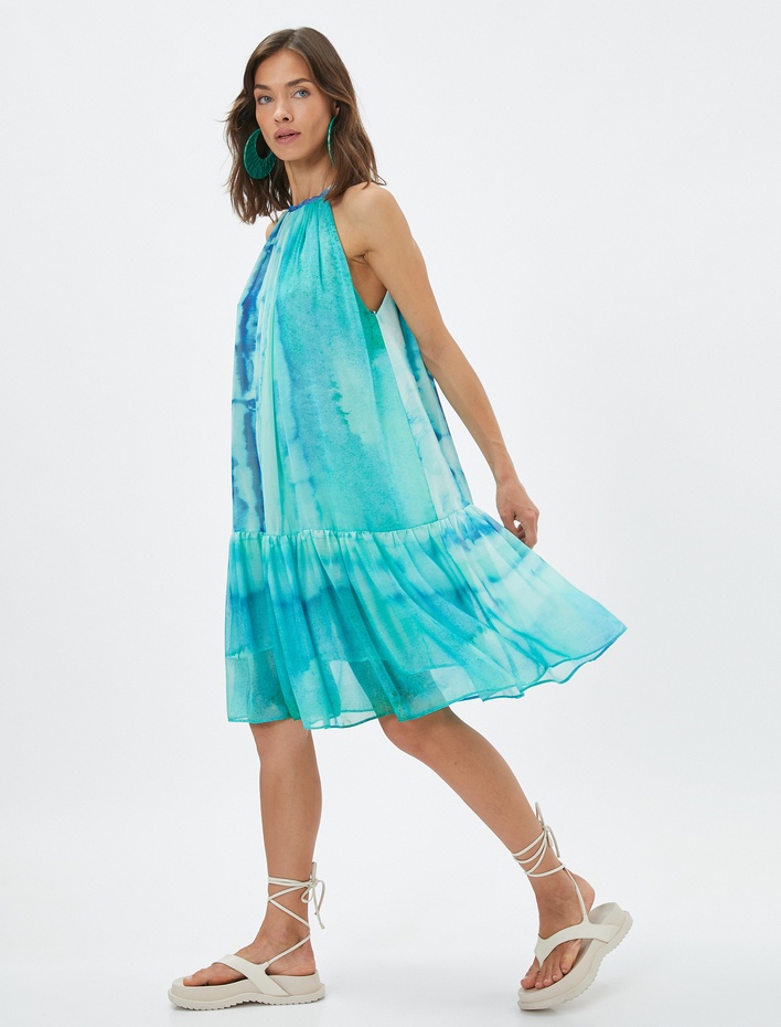 Koton X Selected by Şahika Ercümen - Halter Yaka Batik Desenli Midi Elbise