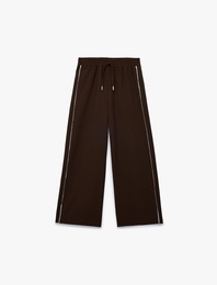 Beli Bağcıklı Biyeli Geniş Paça Pantolon