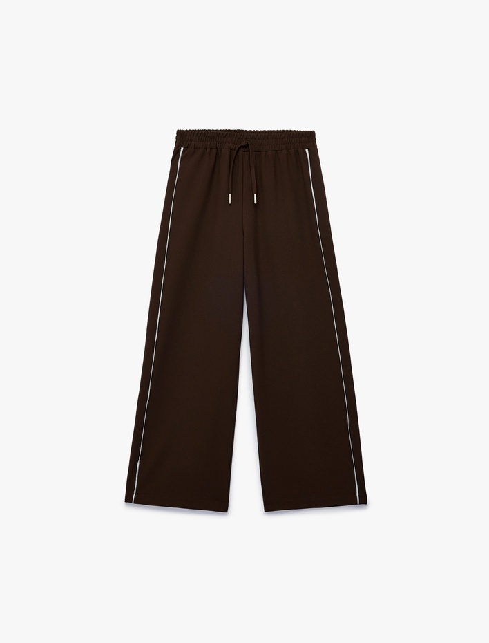 Kız Çocuk Beli Bağcıklı Biyeli Geniş Paça Pantolon