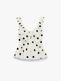 Koton X Sibil Çetinkaya - V Yaka Kolsuz Fırfırlı Peplum Kesim Puantiyeli Poplin Bluz