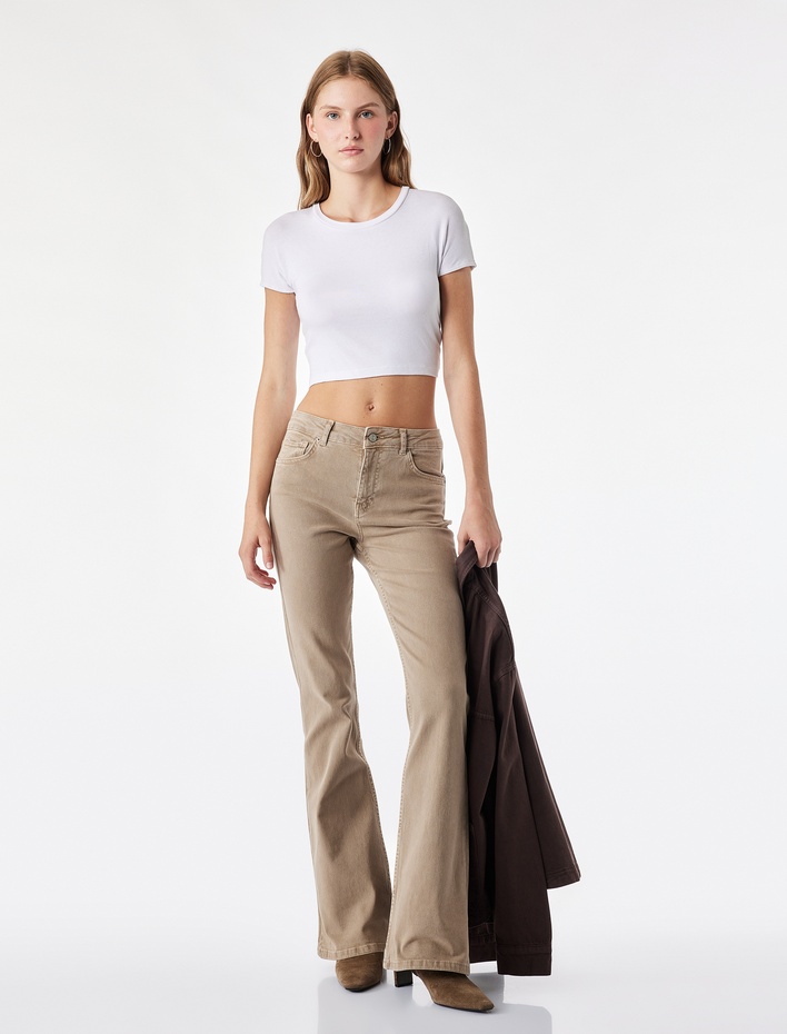  Pamuklu Dar Kesim Yüksek Bel Cepli Düğmeli İspanyol Paça Pantolon - Flare Jeans