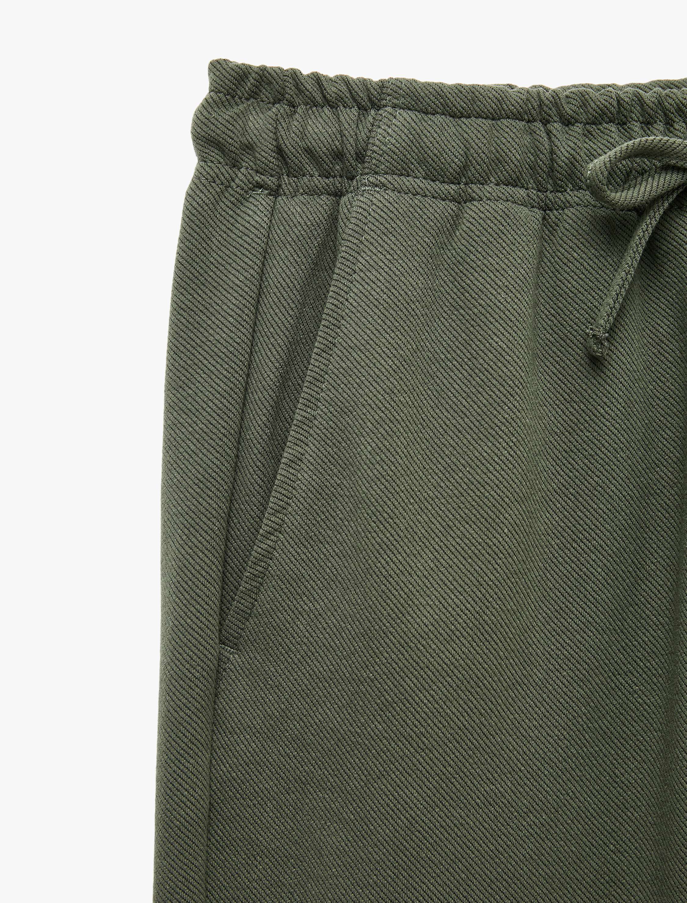   Cepli Beli Bağcıklı Kumaş Pantolon