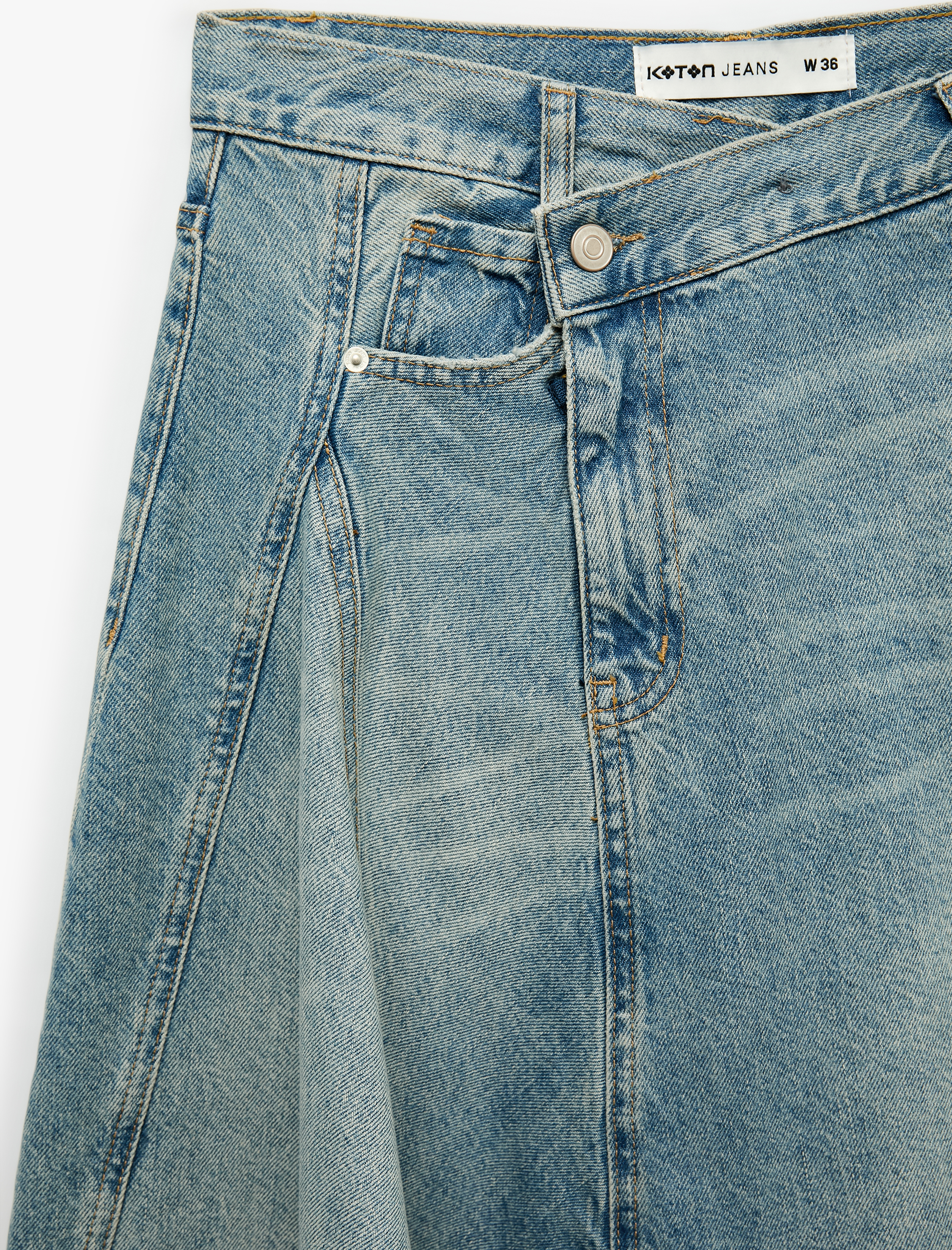   Volanlı Asimetrik Kesim Cepli Normal Bel Düğme Detaylı Pamuklu Denim Etek