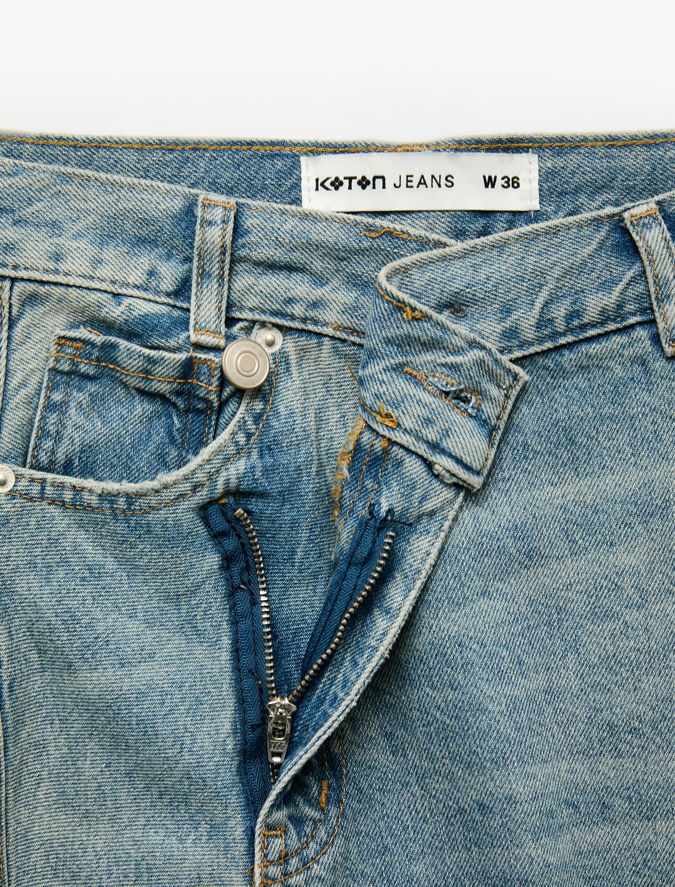   Volanlı Asimetrik Kesim Cepli Normal Bel Düğme Detaylı Pamuklu Denim Etek