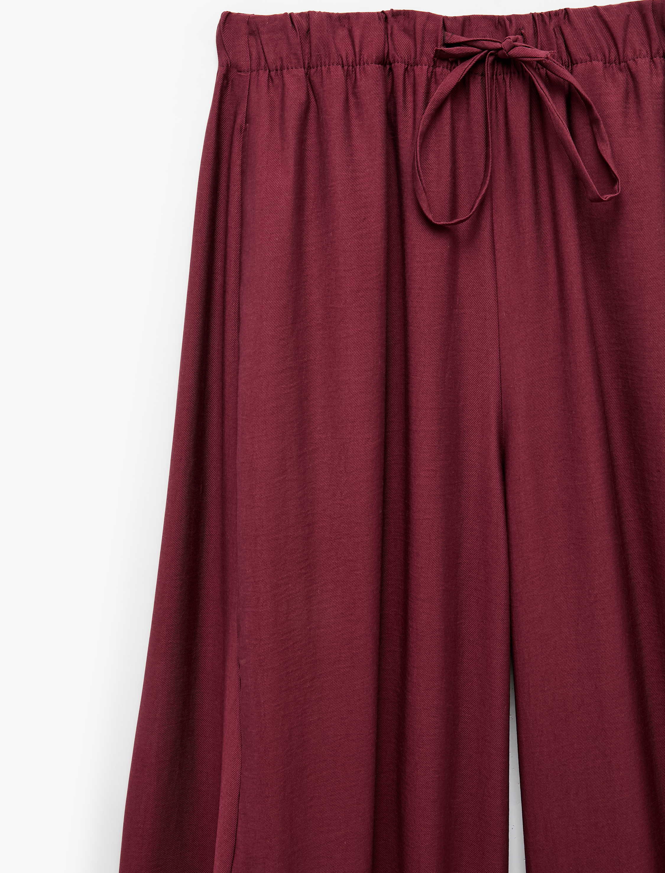   Beli Bağcıklı Cep Detaylı Balon Pantolon