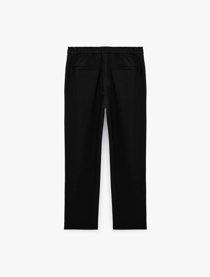  Viskon Karışımlı Cepli Beli Lastikli Düğmeli Slim Fit Pileli Kumaş Pantolon