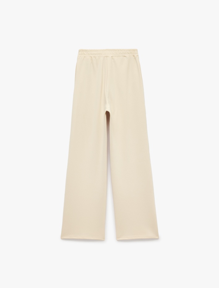  Normal Bel Regular Fit Cepli Düz Geniş Paça Pantolon