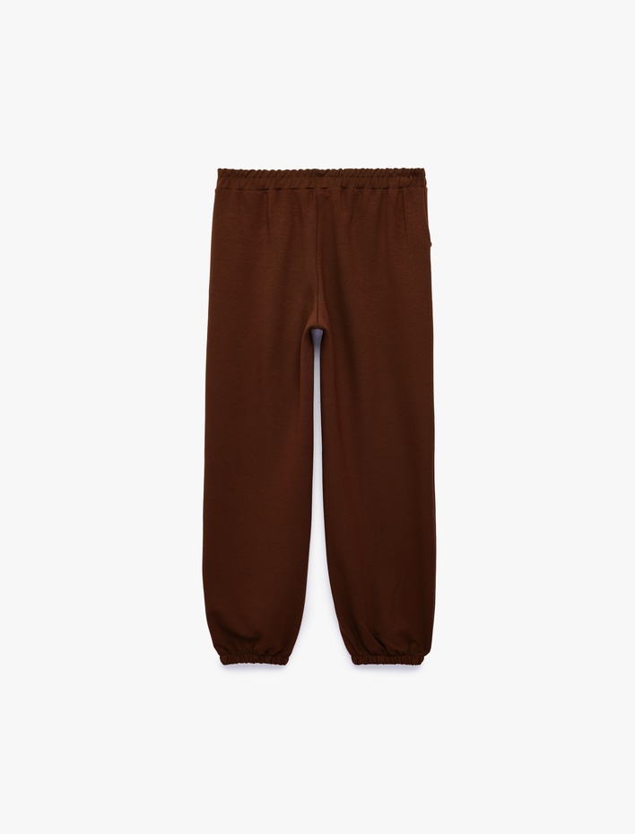 Kız Çocuk Biyeli Cep Detaylı Beli Lastikli Jogger Pantolon