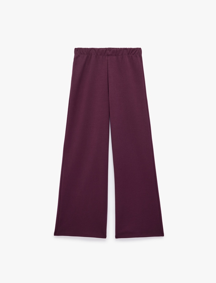  Pamuklu Beli Lastikli Mürdüm Rengi Düz Bol Paça Pantolon