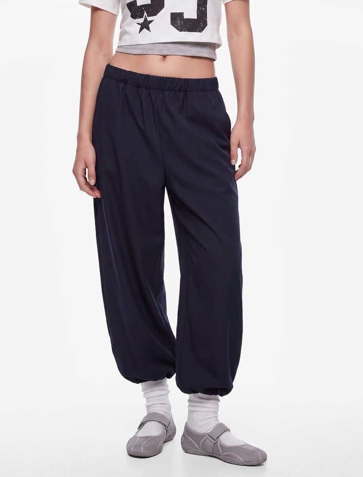  Beli Lastikli Cepli Bol Kesim Harem Pantolon