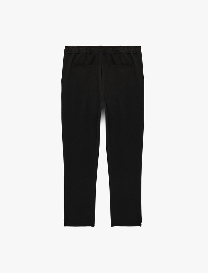  Viskon Karışımlı Cepli Slim Fit Beli Lastikli Bağcıklı Pantolon